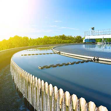 This sedimentation basin slows the flow of wastewater to allow suspended solids to settle.